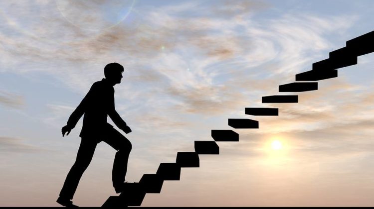 Concept conceptual 3D male businessman on stair or steps over sunset sky background, metaphor to success, climb, business, rise, achievement, growth, job, career, leadership, education, goal or future