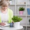 Well organized senior woman with notebook horizontal